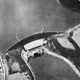 An RAF reconnaissance photo of the Möhne Dam before the attack. Note the torpedo nets above the dam. (Royal Air Force)